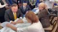 Глава Республики Ингушетия Махмуд-Али Калиматов вместе с родителями трех Героев России проголосовал в городе Сунже